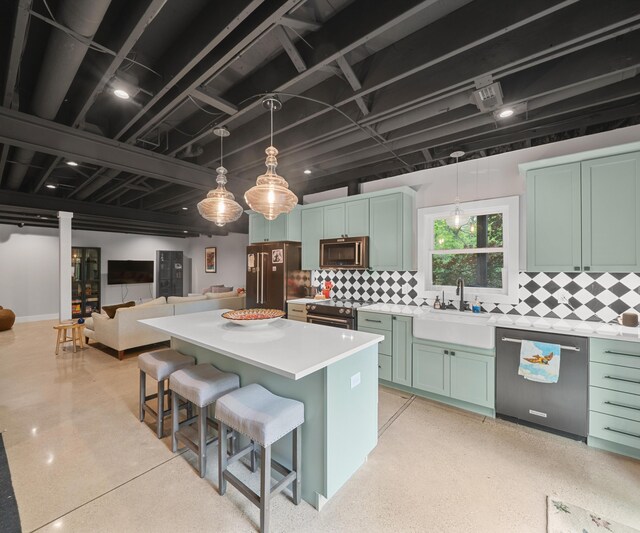 6201 Donovanridge, Dexter, MI 48130 - kitchen with stainless steel appliances, green cabinets, backsplash, and a center island