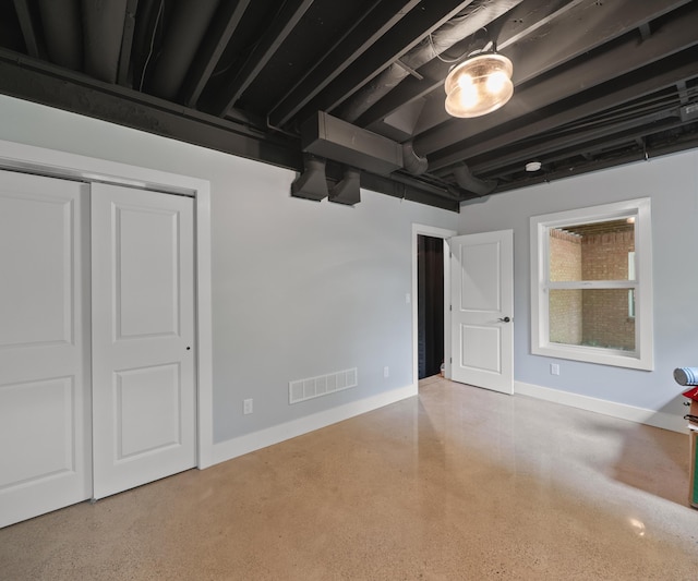 6201 Donovanridge, Dexter, MI 48130 - unfurnished bedroom featuring baseboards and a closet