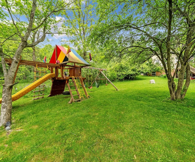 6201 Donovanridge, Dexter, MI 48130 - view of grassy yard featuring a playground