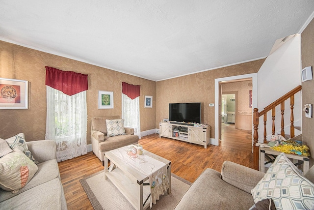 436 Portage St, Grass Lake, MI 49240 - living room featuring wood finished floors and stairs