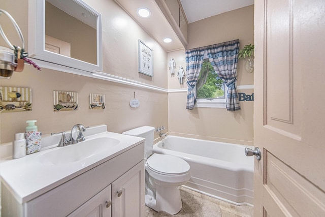 436 Portage St, Grass Lake, MI 49240 - full bathroom with a garden tub, toilet, and vanity
