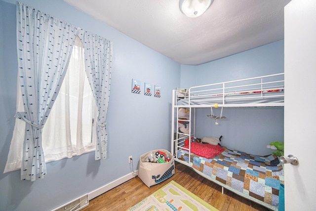 436 Portage St, Grass Lake, MI 49240 - bedroom with wood finished floors and baseboards