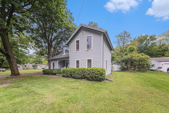 436 Portage St, Grass Lake, MI 49240 - view of front of property with a front yard