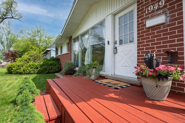 1949 Grove Rd, Ypsilanti, MI 48198 - wooden terrace featuring a lawn