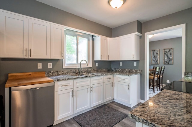 1949 Grove Rd, Ypsilanti, MI 48198 - kitchen with dishwasher, a sink, white cabinets, and dark wood-type flooring