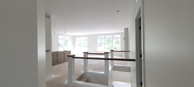 5478 Albright Ave SW Unit 50, Wyoming, MI 49418 - corridor with baseboards and an upstairs landing