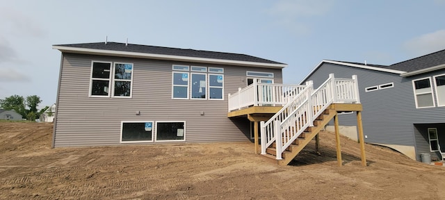 5478 Albright Ave SW Unit 50, Wyoming, MI 49418 - back of house featuring a deck and stairway