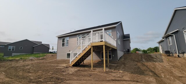 5478 Albright Ave SW Unit 50, Wyoming, MI 49418 - back of house featuring stairs and a wooden deck