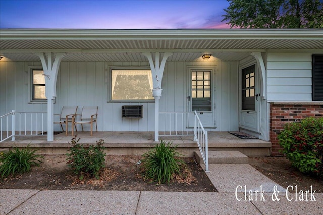 787 Andover St SE Unit 7, Grand Rapids, MI 49548 - exterior entry at dusk with a porch