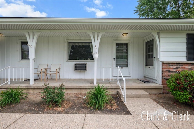 787 Andover St SE Unit 7, Grand Rapids, MI 49548 - property entrance featuring a porch and brick siding