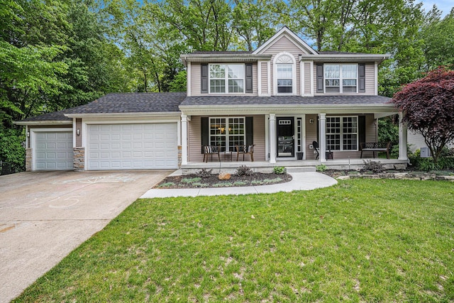 14956 Briarwood St, Grand Haven, MI 49417 - view of front of property with concrete driveway, an attached garage, a front lawn, and a porch