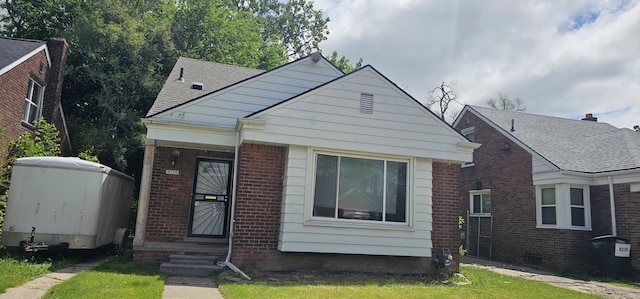 8234 Meyers Rd, Detroit, MI 48228 - bungalow featuring brick siding and a front lawn