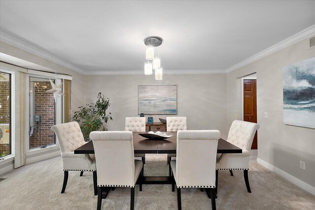 3427 E Dobson Pl, Ann Arbor, MI 48105 - dining area featuring ornamental molding, light carpet, and baseboards
