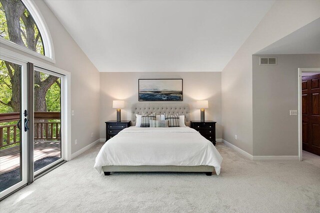 3427 E Dobson Pl, Ann Arbor, MI 48105 - carpeted bedroom featuring access to exterior, baseboards, and high vaulted ceiling