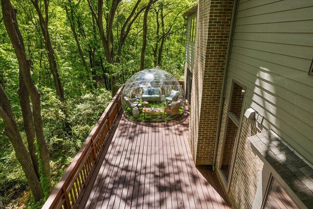 3427 E Dobson Pl, Ann Arbor, MI 48105 - wooden deck with a forest view