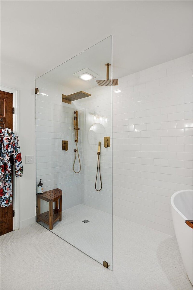 3427 E Dobson Pl, Ann Arbor, MI 48105 - full bathroom featuring a walk in shower and a freestanding tub