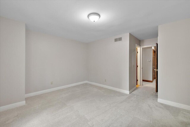 3427 E Dobson Pl, Ann Arbor, MI 48105 - unfurnished room with light carpet and baseboards