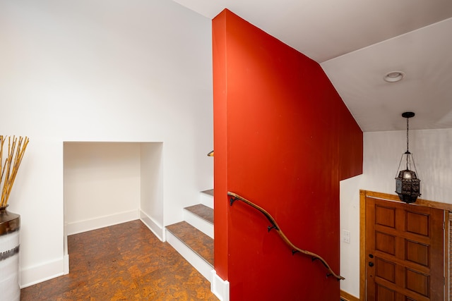 818 S 7th St, Ann Arbor, MI 48103 - stairway featuring lofted ceiling and baseboards