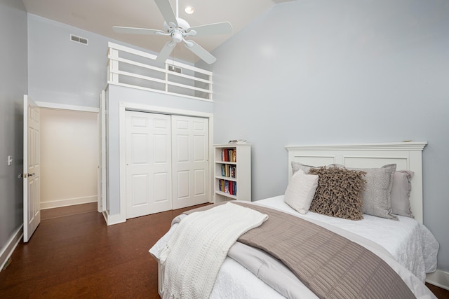 818 S 7th St, Ann Arbor, MI 48103 - bedroom with a closet, ceiling fan, baseboards, and high vaulted ceiling