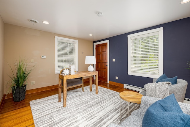 818 S 7th St, Ann Arbor, MI 48103 - home office featuring a baseboard radiator, wood finished floors, recessed lighting, and baseboards