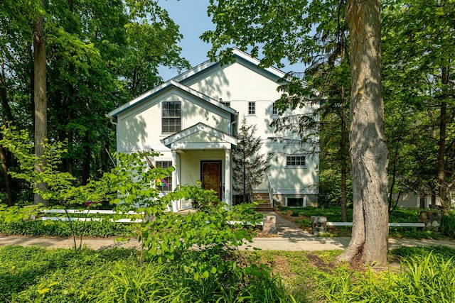 818 S 7th St, Ann Arbor, MI 48103 - view of front facade featuring stucco siding