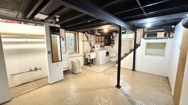 30 Zuidema Ct, Kalamazoo, MI 49001 - basement featuring washer and clothes dryer, a sink, and stairs