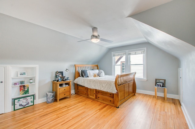 533 Beech St, East Lansing, MI 48823 - bedroom with light wood-style floors, vaulted ceiling, a ceiling fan, and baseboards