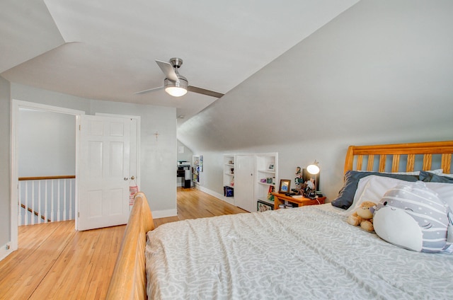 533 Beech St, East Lansing, MI 48823 - bedroom featuring wood finished floors, vaulted ceiling, baseboards, and ceiling fan