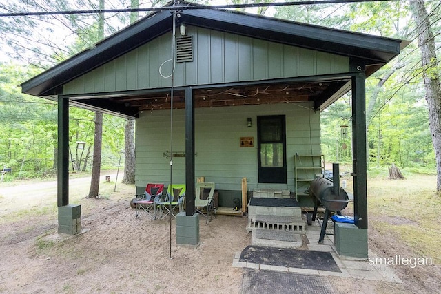 9134 39th Ave, Bitely, MI 49309 - back of property with board and batten siding