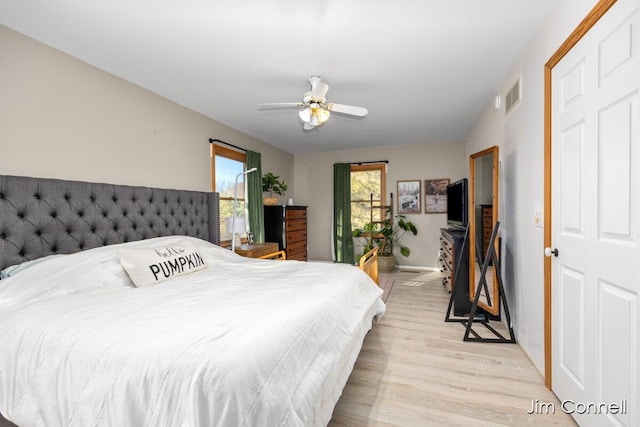 1480 W 72nd St, Newaygo, MI 49337 - bedroom featuring light wood-style floors, ceiling fan, and baseboards