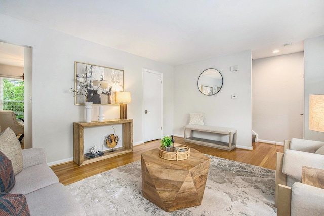 429 S 7th St # 1, Ann Arbor, MI 48103 - living room with wood finished floors, baseboards, and recessed lighting