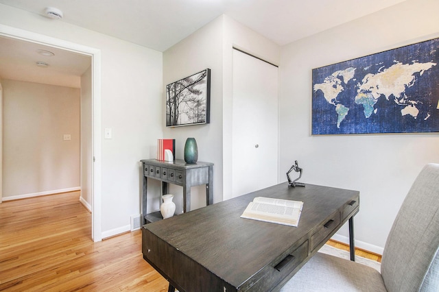 429 S 7th St # 1, Ann Arbor, MI 48103 - home office featuring wood finished floors and baseboards