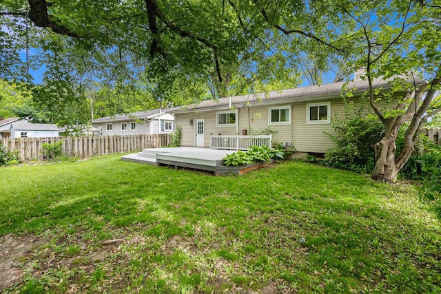 2305 S Circle Dr, Ann Arbor, MI 48103 - rear view of property featuring a deck and a chimney