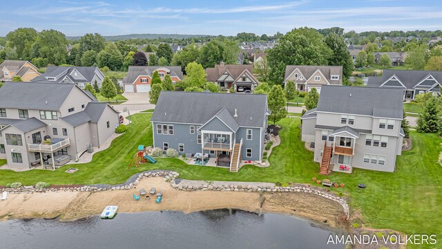 1551 Providence Cove Ct, Byron Center, MI 49315 - aerial perspective of suburban area with a large body of water