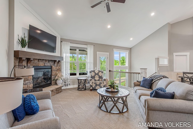 1551 Providence Cove Ct, Byron Center, MI 49315 - living area with carpet flooring, a ceiling fan, a stone fireplace, recessed lighting, and high vaulted ceiling