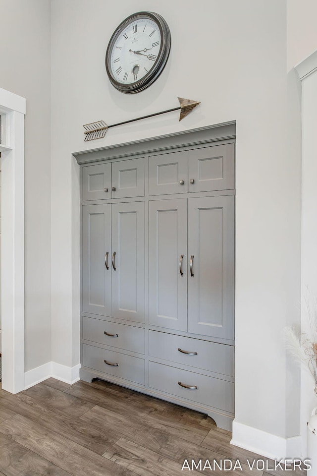 1551 Providence Cove Ct, Byron Center, MI 49315 - detailed view of baseboards and wood finished floors