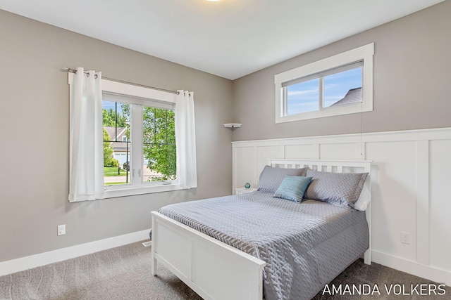 1551 Providence Cove Ct, Byron Center, MI 49315 - carpeted bedroom featuring multiple windows and baseboards