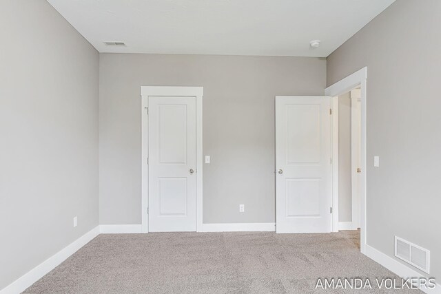 1551 Providence Cove Ct, Byron Center, MI 49315 - unfurnished bedroom with carpet and baseboards