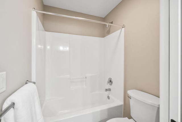 10693 Bear Lake Trl, Portage, MI 49024 - bathroom featuring toilet and shower / tub combination