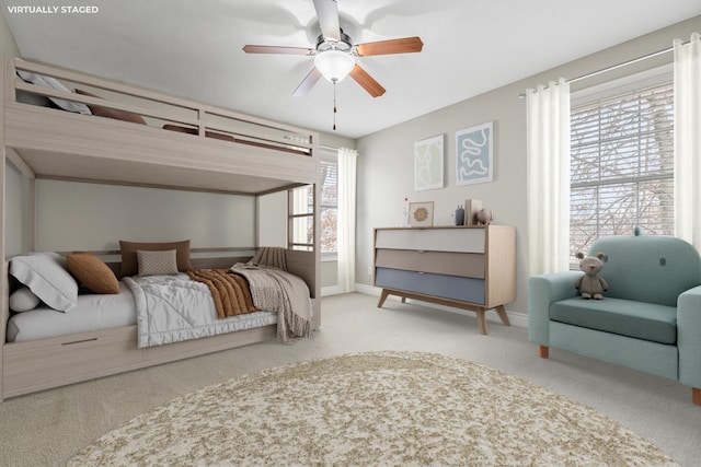10693 Bear Lake Trl, Portage, MI 49024 - bedroom featuring carpet floors, baseboards, and ceiling fan