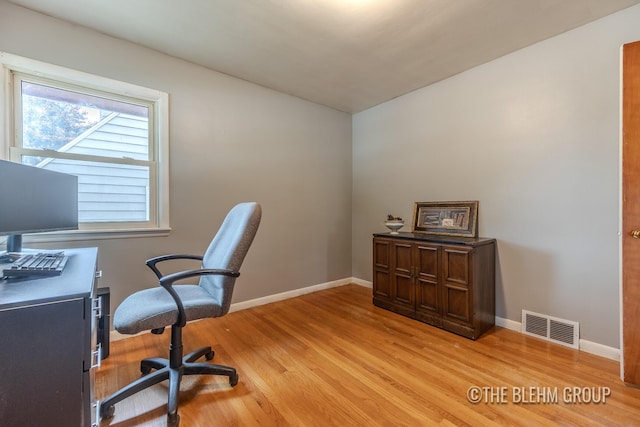 544 Shawmut Blvd NW, Grand Rapids, MI 49504 - office with light wood finished floors and baseboards