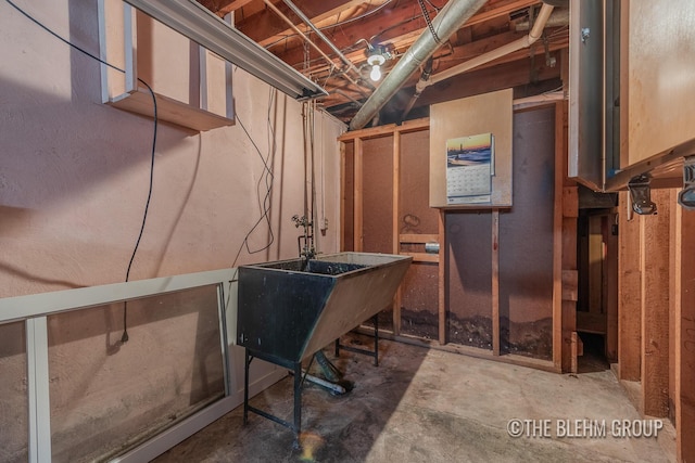 544 Shawmut Blvd NW, Grand Rapids, MI 49504 - unfinished below grade area with a sink