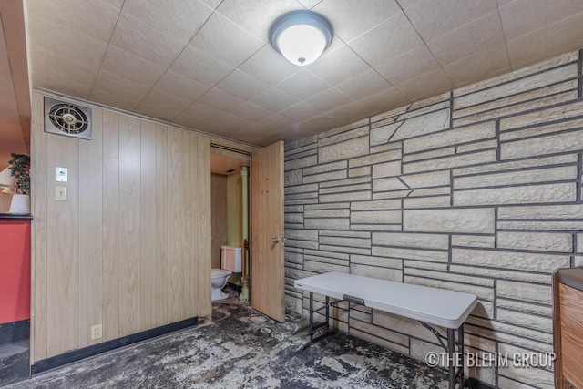 544 Shawmut Blvd NW, Grand Rapids, MI 49504 - misc room featuring wood walls