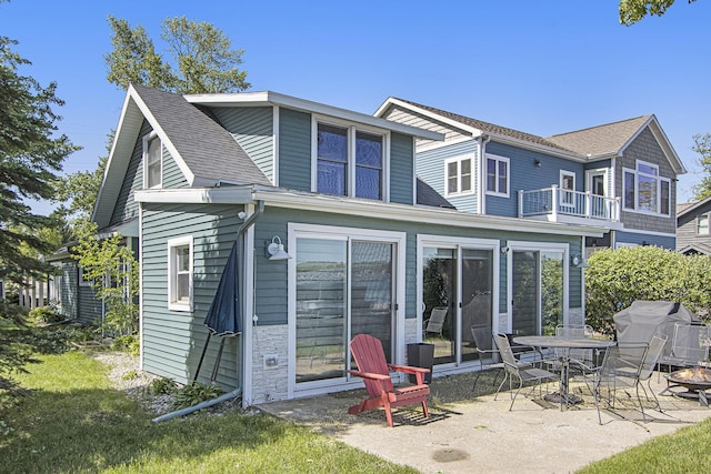 2019 Lakeview Dr, Portage, MI 49002 - back of house with a patio area, a balcony, and roof with shingles