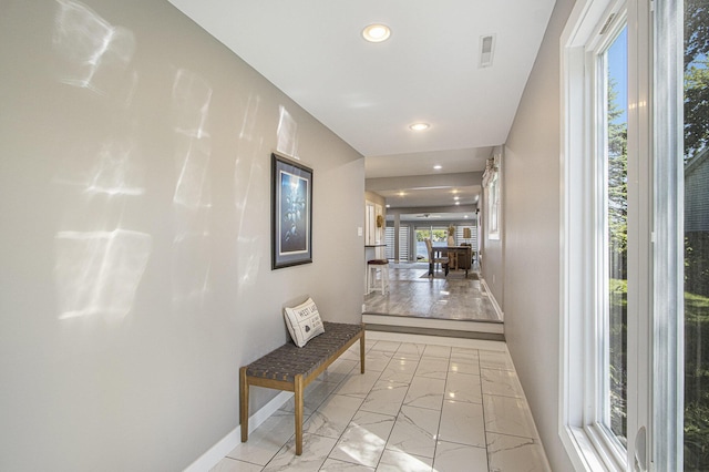 2019 Lakeview Dr, Portage, MI 49002 - corridor featuring light marble finish floors, baseboards, and recessed lighting