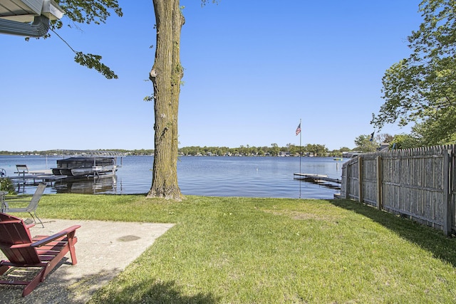 2019 Lakeview Dr, Portage, MI 49002 - view of yard with a boat dock and a water view