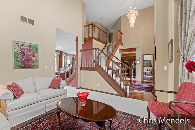 150 Bay Circle Dr, Holland, MI 49424 - living room featuring a towering ceiling and stairway
