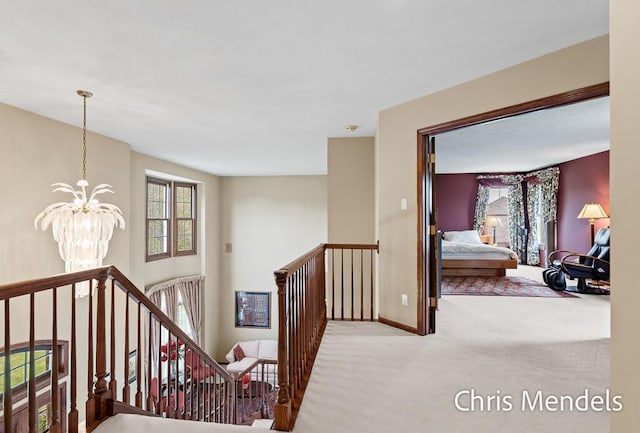 150 Bay Circle Dr, Holland, MI 49424 - corridor with an upstairs landing, a chandelier, carpet flooring, and baseboards