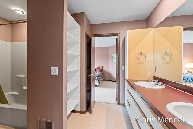150 Bay Circle Dr, Holland, MI 49424 - full bath featuring connected bathroom, double vanity, and a shower