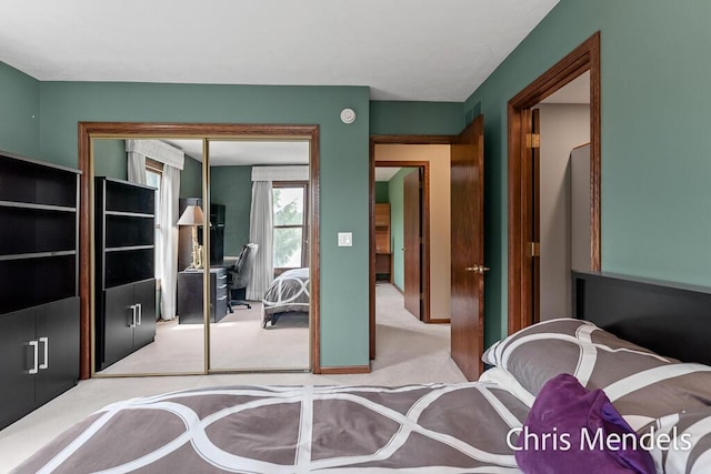 150 Bay Circle Dr, Holland, MI 49424 - carpeted bedroom with a closet and baseboards